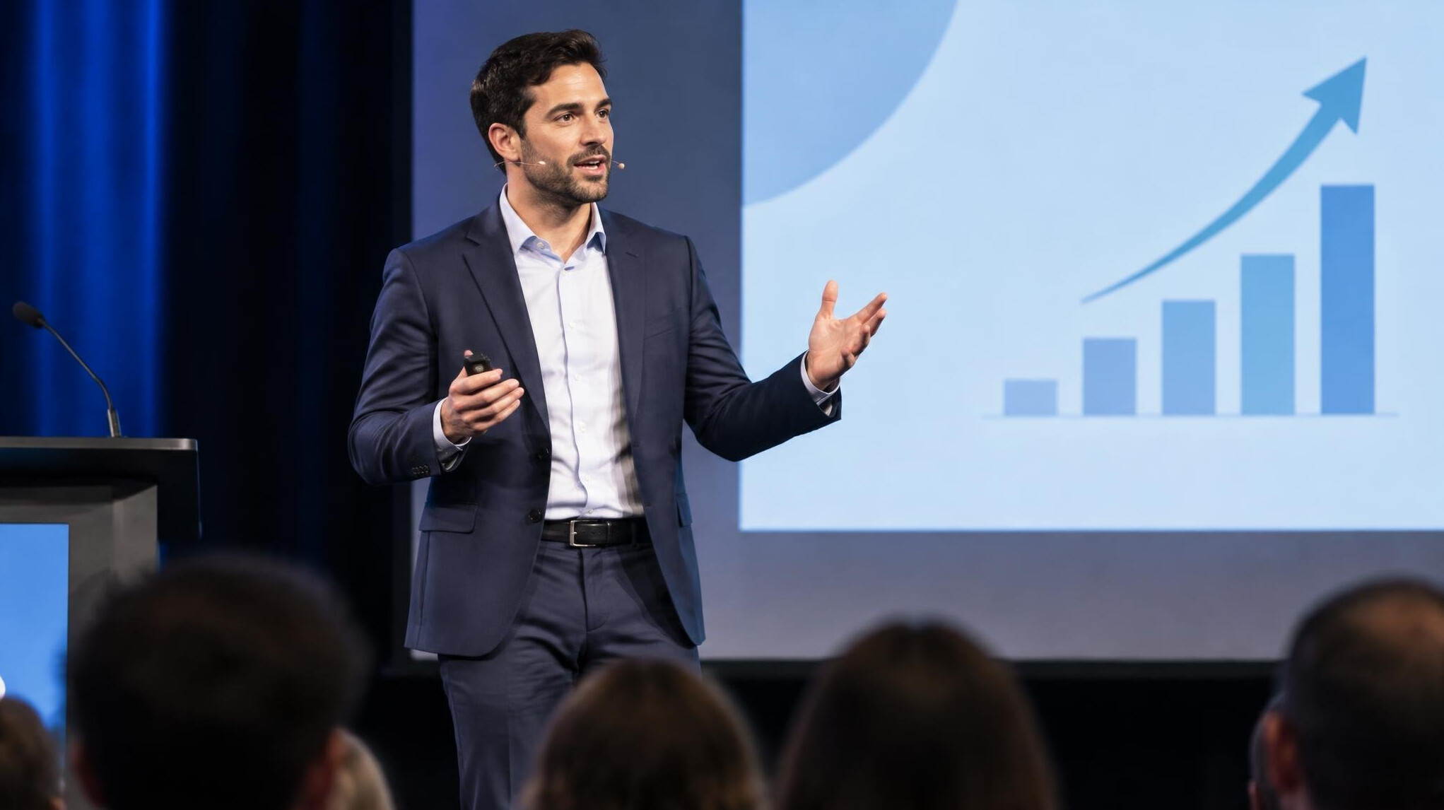 man giving presentation on stage