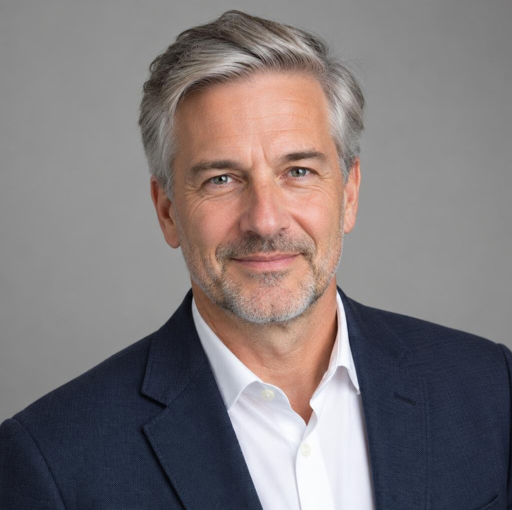 Grey haired German man professional studio portrait